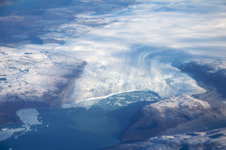 The Jakobshavn glacier calves ice bergs larger than buses at an astounding rate, draining the Greenland Ice Sheet faster than any other outlet.
